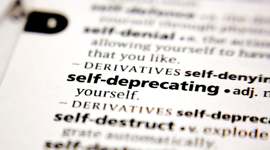 Understanding Self-deprecation: Meaning, Signs, & Impact